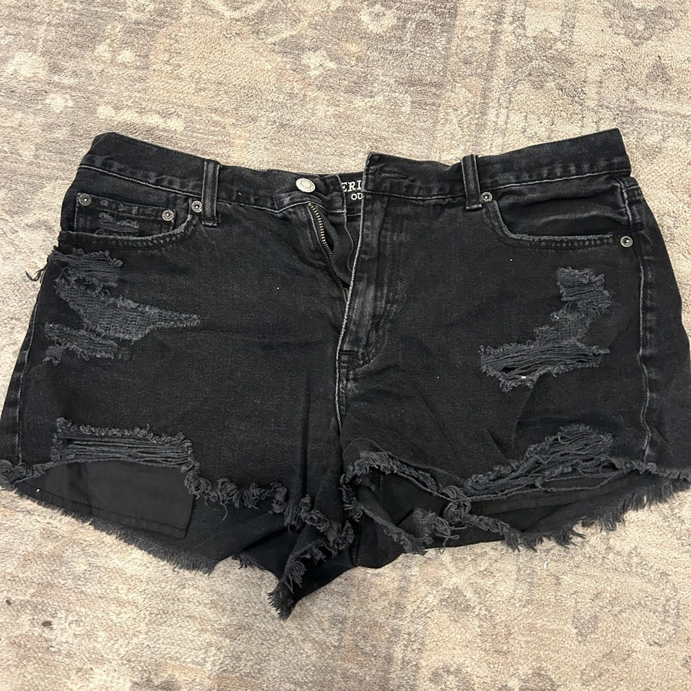 Black denim shorts.
